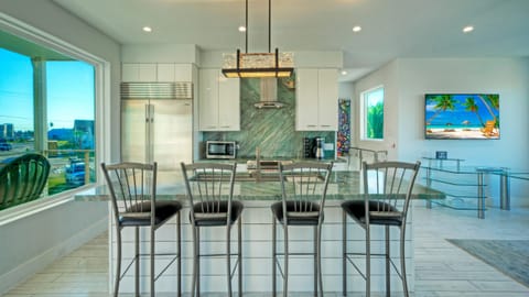 Enjoy casual dining and conversation at the kitchen counter.