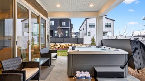 Private covered patio with a relaxing hot tub—perfect for unwinding after a day on the slopes or enjoying crisp Park City evenings outdoors.