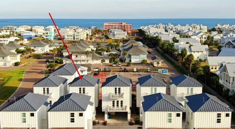 Aerial view of the property location and its proximity to the beach.