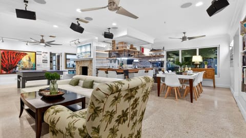 Spacious open-concept living, dining, and game room perfect for groups.