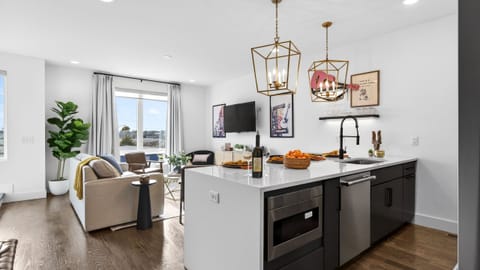 An open-concept layout that keeps the kitchen at the heart of the home, ideal for easy hosting and everyday comfort.