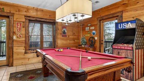Game room featuring a full-sized billiard table.
