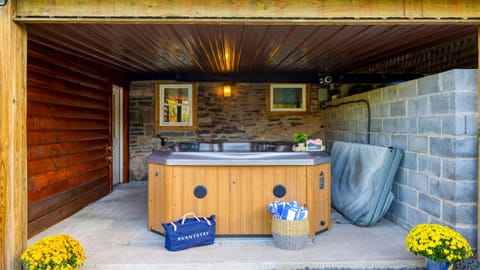 Enjoy a rejuvenating soak in the hot tub.