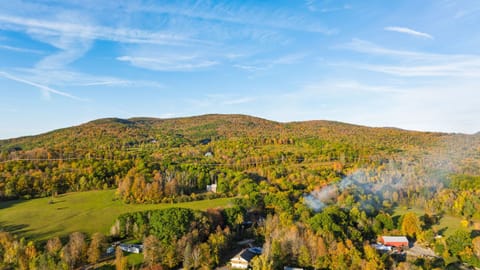 Rolling Berkshires landscape stretching beyond the property.