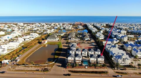 Aerial view showing the property’s proximity to the beach and local ponds.