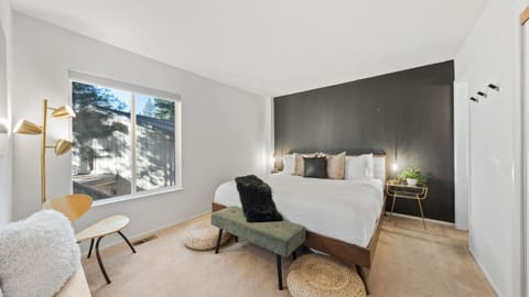 The primary bedroom features a king bed and an ensuite bathroom.