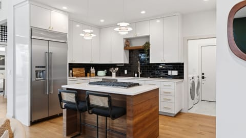 Theater-style media room with projector.