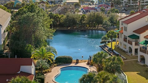 The balcony is equipped with a ceiling fan for year-round comfort.