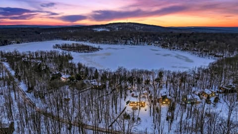 Secluded retreat nestled deep within the snowy woods.