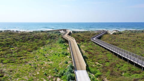 Sunrise Beach #44 - Between the Shores: Take the boardwalk and walk to the beach.