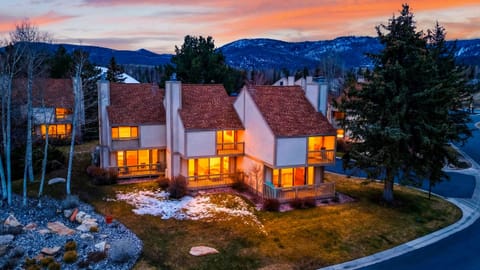 Sunset glow over the mountains—your Park City condo retreat, warm-lit and ready for cozy nights in.