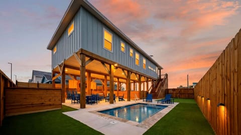 Private backyard pool, covered hangout space, and plenty of room to unwind after the beach.