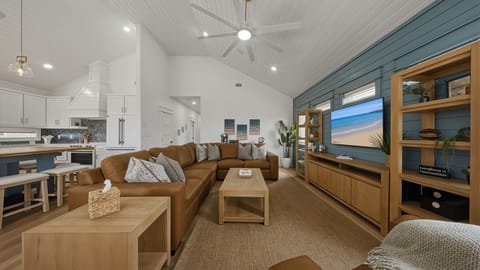 Coastal-chic comfort, open-concept living area made for the whole crew.