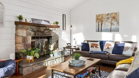 Living room offers a cozy retreat and selection of board games.