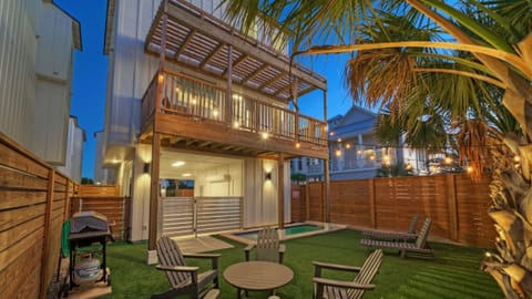 Evening view of the private backyard patio and the plunge pool. (Villa Blanca)