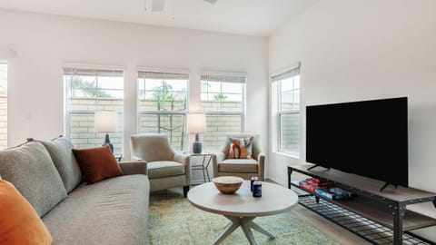 Step into a light-filled living area designed for relaxation and modern style.