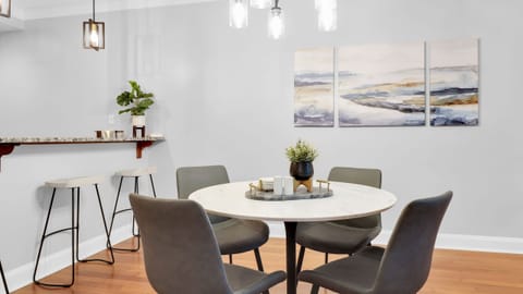Gather for meals or morning coffee in this bright, open dining space just off the kitchen.