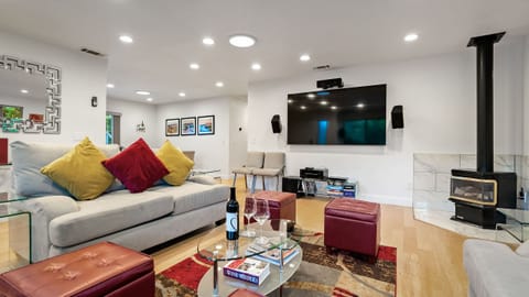 Large sectional and fireplace anchor this relaxed living room