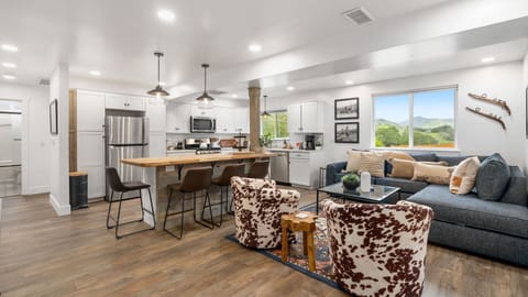 Gather around the island with mountain views beyond