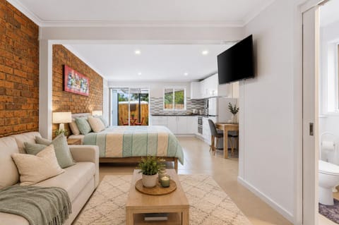 Patio, Bed, TV and multimedia, Kitchen or kitchenette, Photo of the whole room, Decorative detail, Seating area, Dining area