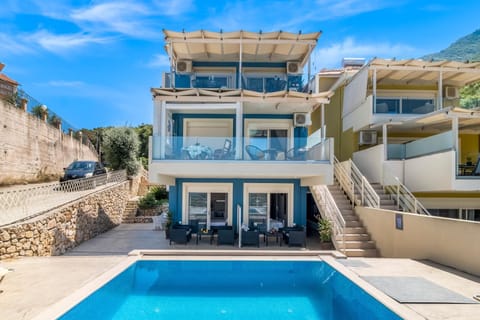 Property building, Living room, Swimming pool