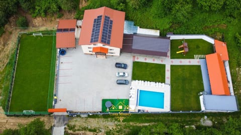 Property building, Day, Neighbourhood, Natural landscape, Bird's eye view, Pool view, Swimming pool, Parking