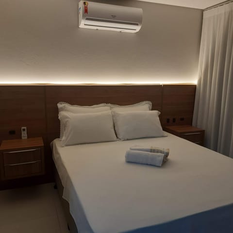 Bed, Photo of the whole room, Bedroom, towels, air conditioner