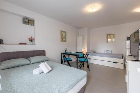 Bed, Living room, Seating area, Bedroom