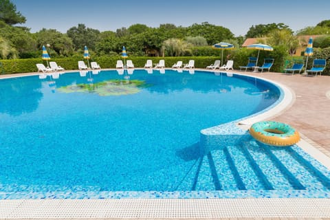 Property building, Living room, Swimming pool