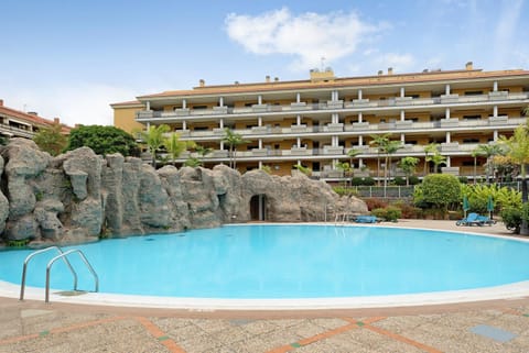 Property building, Living room, Swimming pool