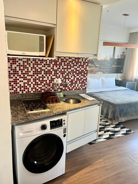 Kitchen or kitchenette, minibar, washing machine, dryer