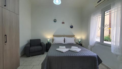 Bed, Photo of the whole room, Bedroom, towels, air conditioner