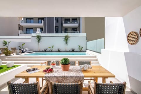 Patio, Dining area, Pool view, Swimming pool