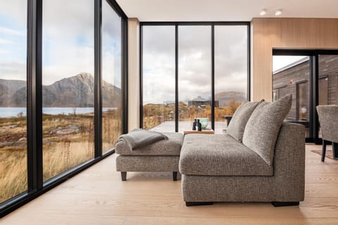 View (from property/room), Living room, Seating area, Mountain view, Sea view