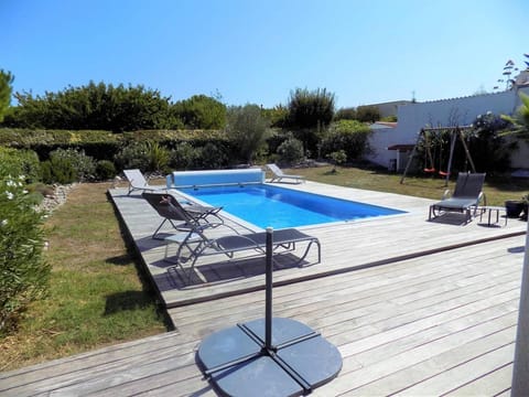 Patio, Day, Natural landscape, Pool view, Swimming pool, sunbed