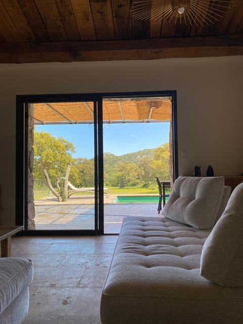 Natural landscape, Living room, Seating area, Mountain view, Pool view, Swimming pool