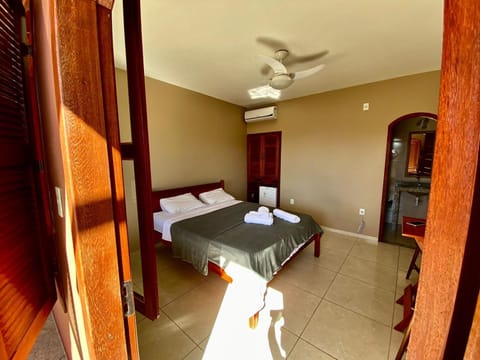 Bed, Photo of the whole room, Bedroom, fireplace, towels, air conditioner