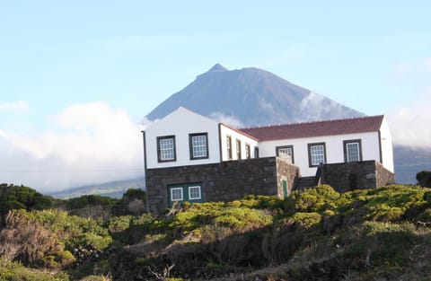 Property building, Nearby landmark, Day, Natural landscape, Mountain view