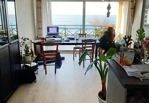 Communal lounge/ TV room, Living room, Seating area, Dining area, Sea view