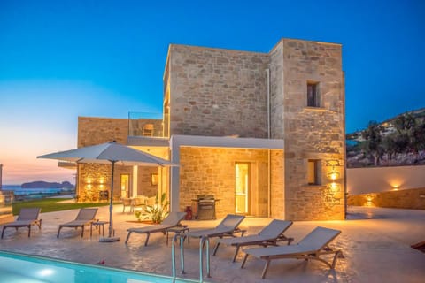 Property building, Patio, Natural landscape, Pool view, Sea view, Swimming pool, sunbed