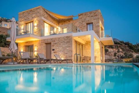 Property building, Patio, Night, Pool view, Swimming pool, sunbed