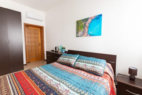 Bed, wardrobe, air conditioner