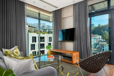 TV and multimedia, View (from property/room), Living room, Seating area, Mountain view