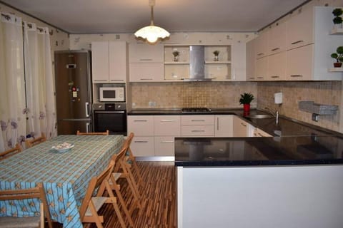 Kitchen or kitchenette, Dining area, dishwasher, oven, toaster