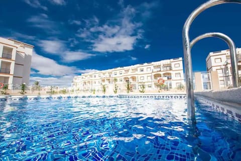 Property building, Day, Pool view, Swimming pool
