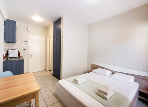 Bed, Photo of the whole room, towels, wardrobe
