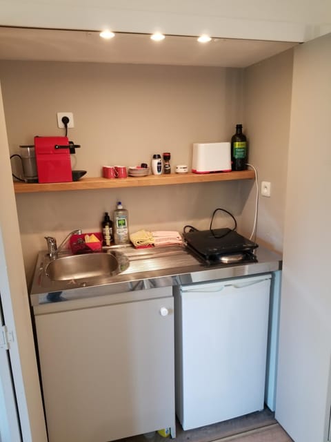 Kitchen or kitchenette, stove