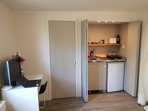 Kitchen or kitchenette, stove, kitchen