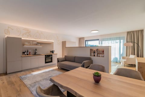 Kitchen or kitchenette, Living room, Seating area, Dining area