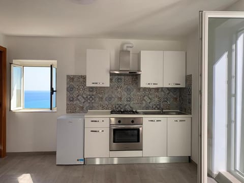 Kitchen or kitchenette, stove